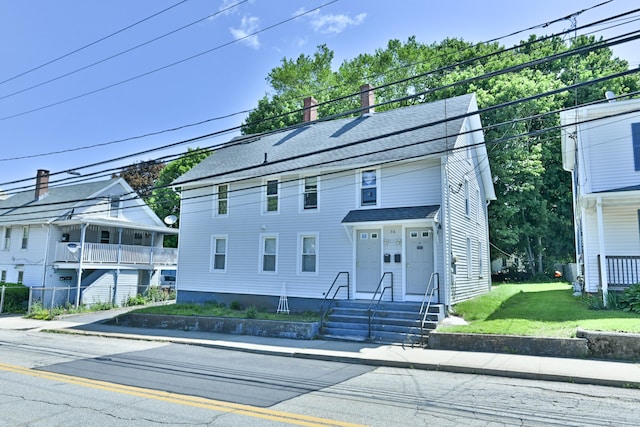 96 Water St, Killingly, CT 06239 - view of front of property featuring a chimney, a front lawn, and a shingled roof