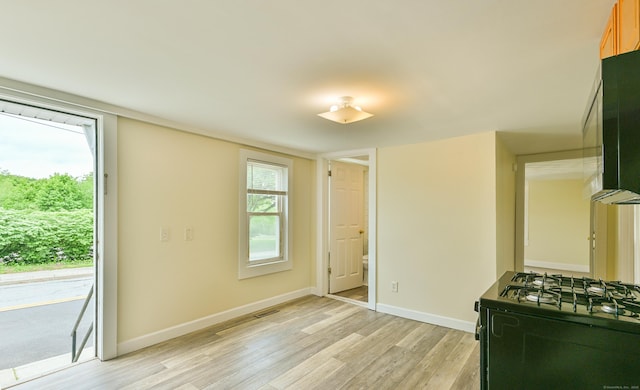 96 Water St, Killingly, CT 06239 - unfurnished dining area featuring light wood finished floors and baseboards