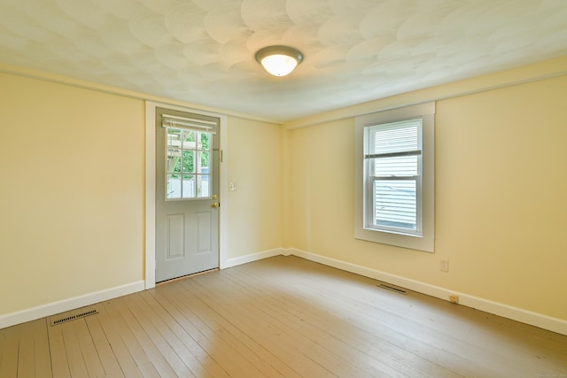 96 Water St, Killingly, CT 06239 - unfurnished room featuring hardwood / wood-style flooring and baseboards