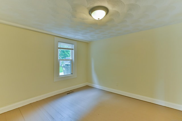 96 Water St, Killingly, CT 06239 - spare room featuring light wood-type flooring and baseboards