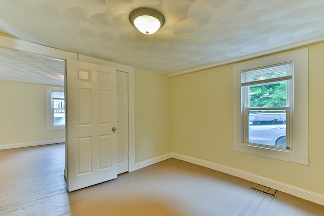 96 Water St, Killingly, CT 06239 - spare room featuring baseboards and wood finished floors
