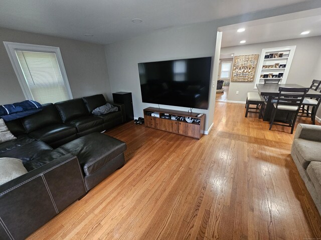 216 Bunker Hill Ave, Waterbury, CT 06708 - living room with light wood-style floors, baseboards, and recessed lighting