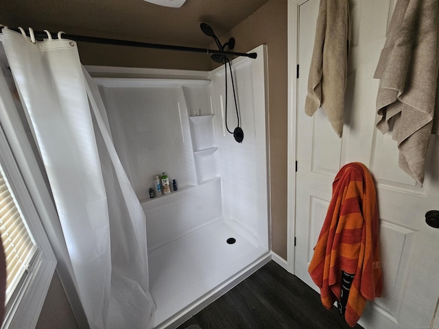 216 Bunker Hill Ave, Waterbury, CT 06708 - full bathroom with wood finished floors and a shower with curtain
