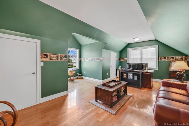 197 Shadow Pond Ln, Suffield, CT 06078 - living room with plenty of natural light, light wood-type flooring, lofted ceiling, and baseboards