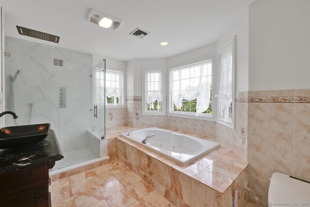 197 Shadow Pond Ln, Suffield, CT 06078 - full bath with a jetted tub, a shower stall, vanity, toilet, and marble finish flooring