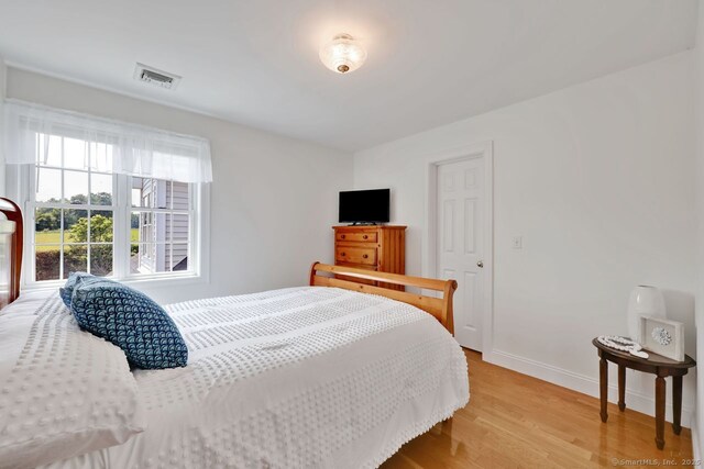 197 Shadow Pond Ln, Suffield, CT 06078 - bedroom featuring light wood finished floors and baseboards