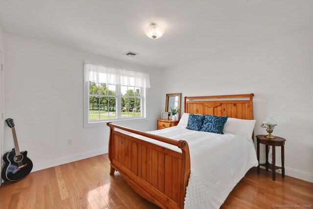 197 Shadow Pond Ln, Suffield, CT 06078 - bedroom featuring wood finished floors and baseboards