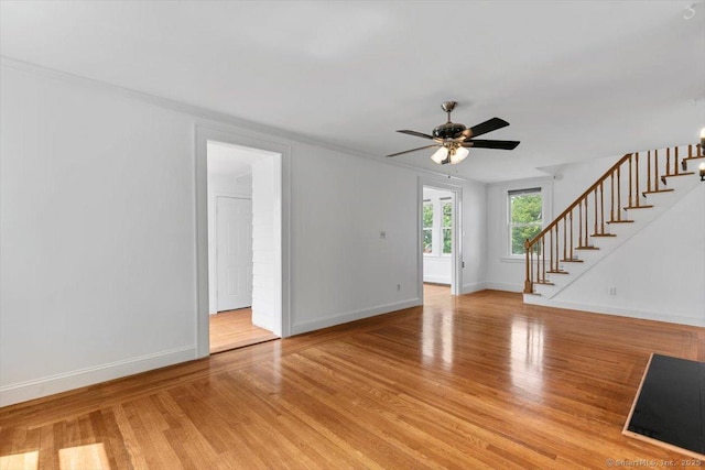 37 Park Ave, Hamden, CT 06517 - unfurnished living room with stairway, baseboards, ceiling fan, and light wood finished floors