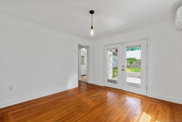37 Park Ave, Hamden, CT 06517 - empty room featuring healthy amount of natural light, light wood finished floors, crown molding, and baseboards