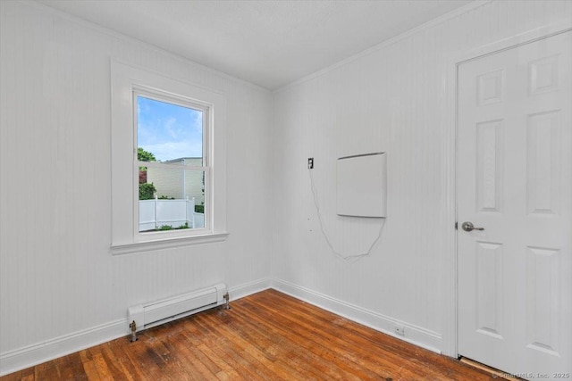37 Park Ave, Hamden, CT 06517 - unfurnished room with a baseboard radiator, crown molding, wood finished floors, and baseboards