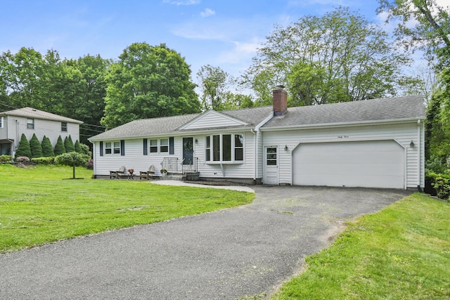 63 Paul Ter, Southington, CT 06489 - single story home featuring a chimney, an attached garage, asphalt driveway, a front yard, and a shingled roof