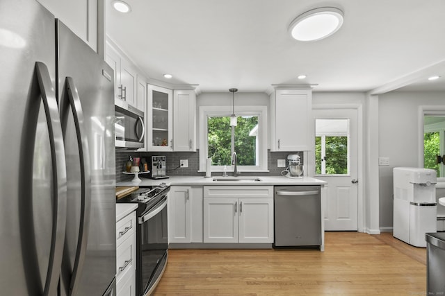 63 Paul Ter, Southington, CT 06489 - kitchen featuring appliances with stainless steel finishes, a sink, light countertops, healthy amount of natural light, and recessed lighting