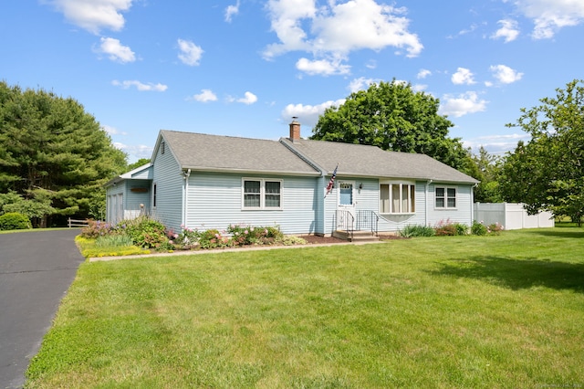 7 Wawecus Hill Rd, Bozrah, CT 06334 - view of front facade featuring a chimney and a shingled roof