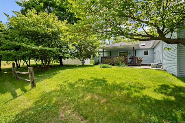 7 Wawecus Hill Rd, Bozrah, CT 06334 - view of grassy yard with a deck