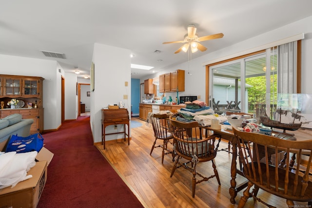 7 Wawecus Hill Rd, Bozrah, CT 06334 - dining space with ceiling fan, light wood finished floors, and baseboards