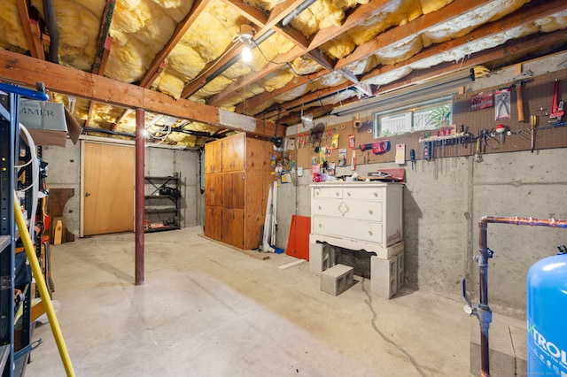 7 Wawecus Hill Rd, Bozrah, CT 06334 - below grade area featuring a workshop area and a water pressure tank