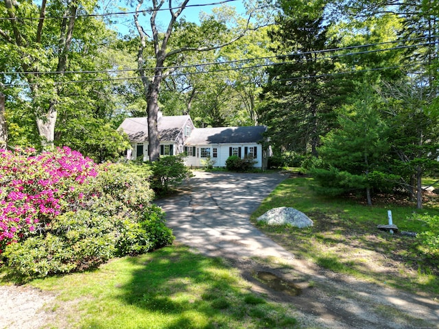 121 Warren Ave, Groton, CT 06355 - view of front of house with asphalt driveway and a front lawn