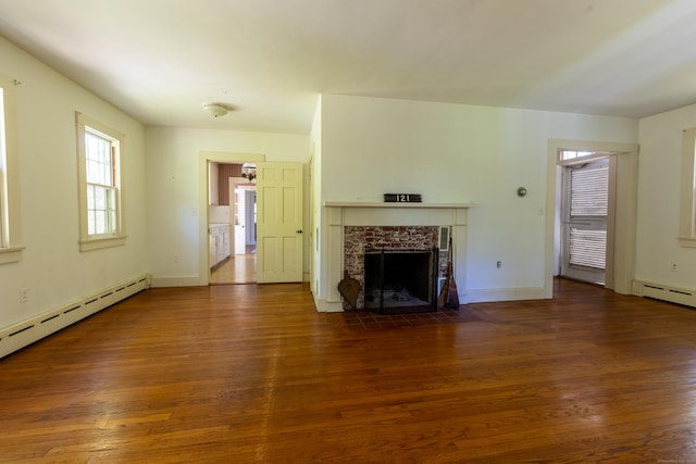 121 Warren Ave, Groton, CT 06355 - unfurnished living room featuring wood finished floors, a fireplace, and baseboards