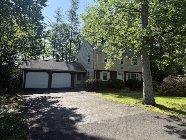 49 Carver Cir, Simsbury, CT 06070 - colonial home with a garage and driveway