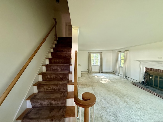 49 Carver Cir, Simsbury, CT 06070 - stairs with carpet flooring and a brick fireplace