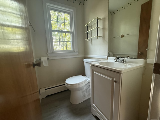 49 Carver Cir, Simsbury, CT 06070 - bathroom featuring a baseboard radiator, toilet, vanity, and wood finished floors