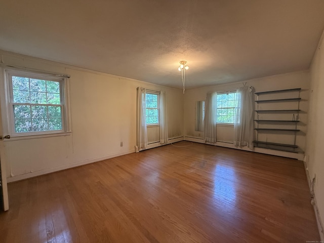 49 Carver Cir, Simsbury, CT 06070 - unfurnished room with wood finished floors and baseboards