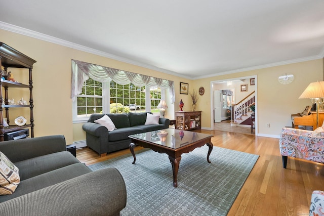 26 Dale Rd, Trumbull, CT 06611 - living room featuring stairway, a baseboard radiator, ornamental molding, wood finished floors, and baseboards