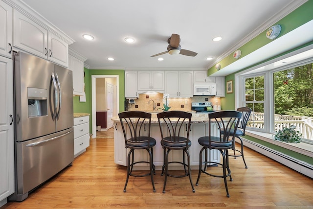 26 Dale Rd, Trumbull, CT 06611 - kitchen featuring stainless steel refrigerator with ice dispenser, white microwave, electric range, crown molding, and white cabinetry