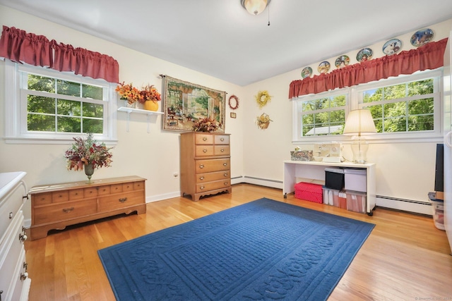 26 Dale Rd, Trumbull, CT 06611 - living area featuring baseboard heating and light wood-style floors