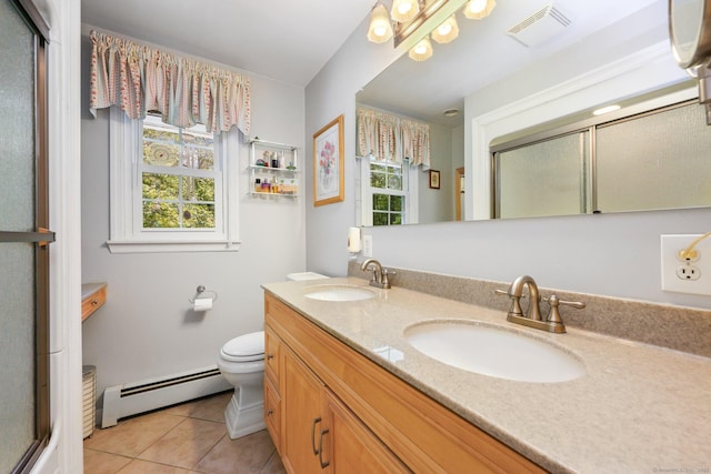 26 Dale Rd, Trumbull, CT 06611 - bathroom featuring baseboard heating, toilet, an enclosed shower, double vanity, and tile patterned flooring