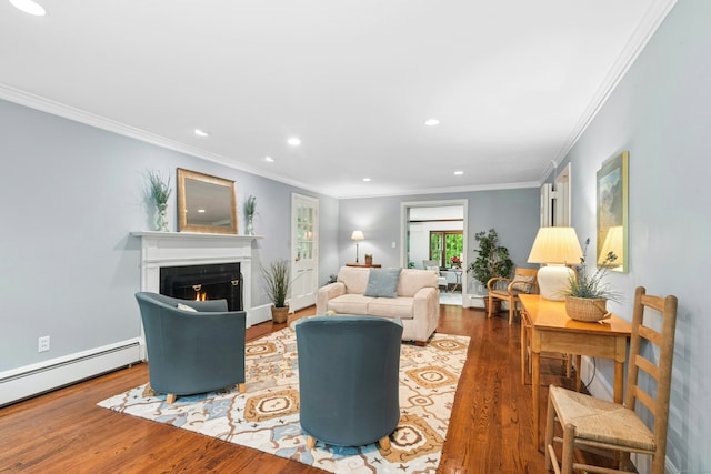 1111 Merwins Ln, Fairfield, CT 06824 - living room with a baseboard radiator, wood finished floors, recessed lighting, a lit fireplace, and ornamental molding