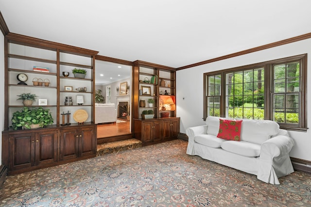 1111 Merwins Ln, Fairfield, CT 06824 - living room featuring crown molding, baseboards, and a warm lit fireplace