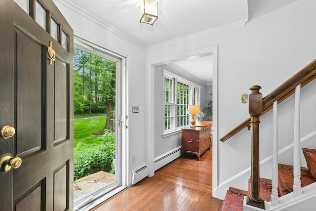 1111 Merwins Ln, Fairfield, CT 06824 - foyer featuring stairs, crown molding, wood-type flooring, a baseboard heating unit, and baseboards