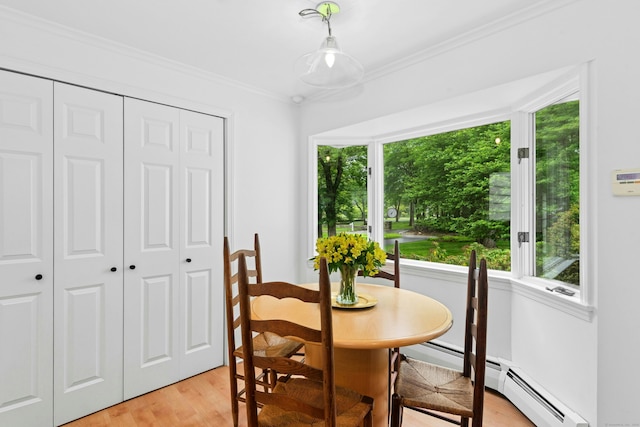 1111 Merwins Ln, Fairfield, CT 06824 - dining room with healthy amount of natural light, crown molding, and light wood-type flooring