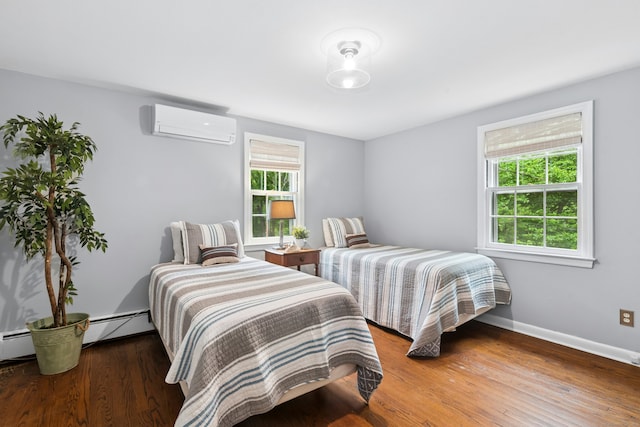 1111 Merwins Ln, Fairfield, CT 06824 - bedroom with a wall mounted AC, wood finished floors, and baseboards