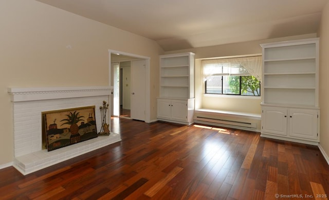926 Heritage Vlg Unit B, Southbury, CT 06488 - unfurnished living room featuring a baseboard radiator, dark wood-style flooring, a fireplace, lofted ceiling, and baseboards
