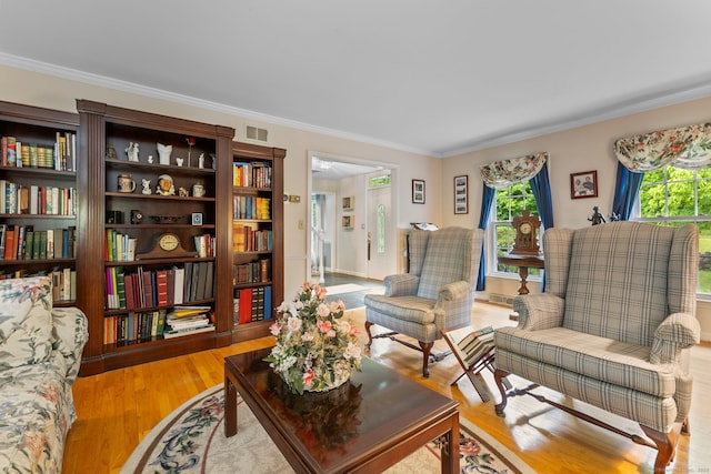 39 Munn Rd, Southbury, CT 06488 - living room with plenty of natural light, crown molding, and light wood finished floors