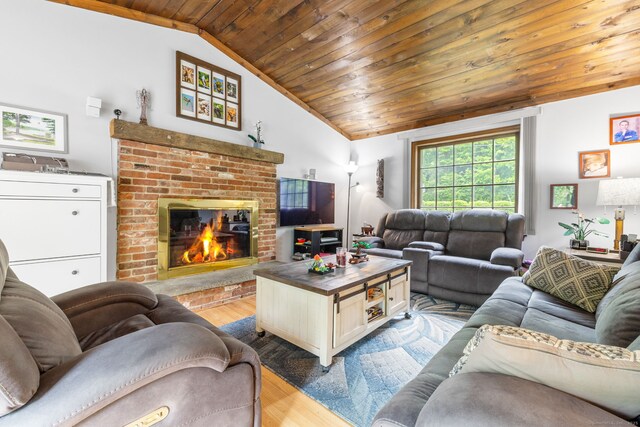39 Munn Rd, Southbury, CT 06488 - living room featuring wood finished floors, vaulted ceiling, wooden ceiling, and a fireplace