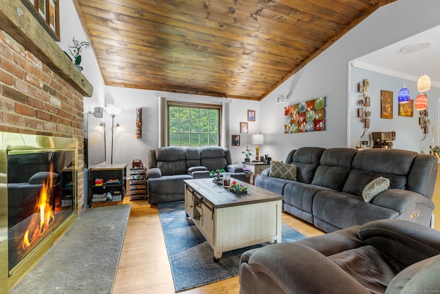 39 Munn Rd, Southbury, CT 06488 - living area featuring a fireplace, light wood-type flooring, lofted ceiling, wooden ceiling, and crown molding