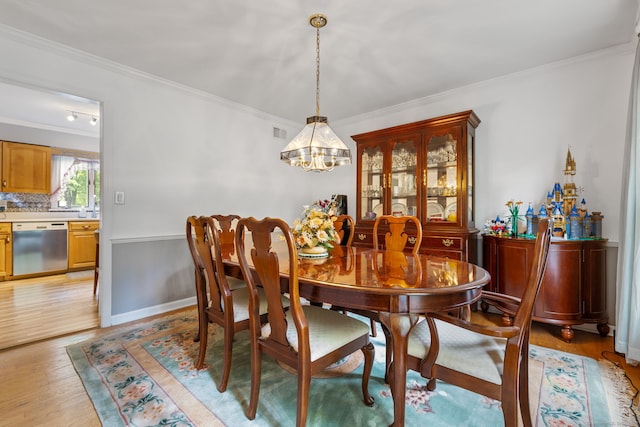39 Munn Rd, Southbury, CT 06488 - dining room featuring crown molding, a chandelier, and light wood-type flooring