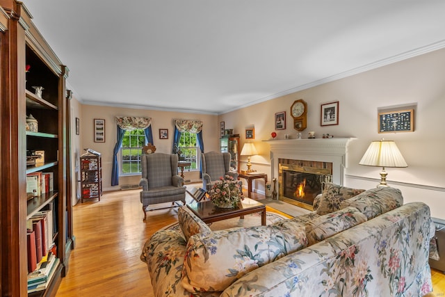 39 Munn Rd, Southbury, CT 06488 - living room with crown molding, light wood finished floors, and a fireplace with flush hearth