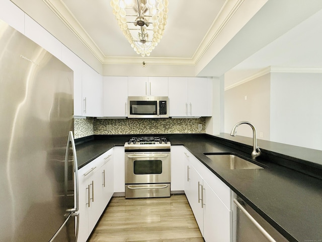 25 Forest St Unit 11A, Stamford, CT 06901 - kitchen featuring appliances with stainless steel finishes, a sink, dark countertops, decorative backsplash, and ornamental molding