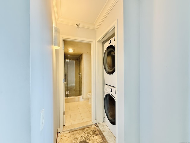 25 Forest St Unit 11A, Stamford, CT 06901 - laundry area with stacked washer / dryer and crown molding