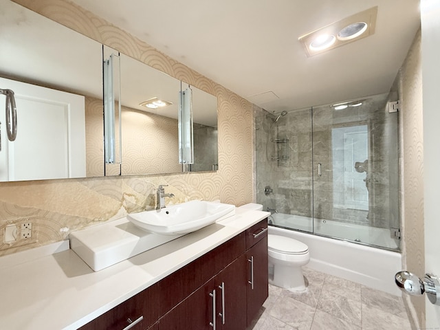 25 Forest St Unit 11A, Stamford, CT 06901 - full bath featuring vanity, toilet, combined bath / shower with glass door, and backsplash