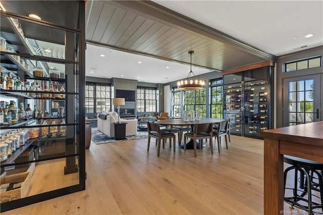 66 High St Unit 17, Guilford, CT 06437 - dining area with wood finished floors and a bar