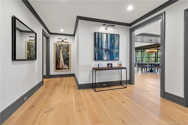 66 High St Unit 17, Guilford, CT 06437 - corridor featuring crown molding, light wood-type flooring, baseboards, and recessed lighting