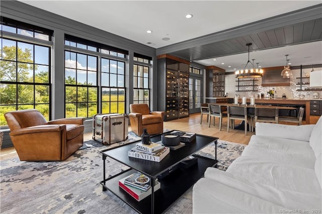 66 High St Unit 17, Guilford, CT 06437 - living room featuring wood finished floors, a chandelier, and recessed lighting
