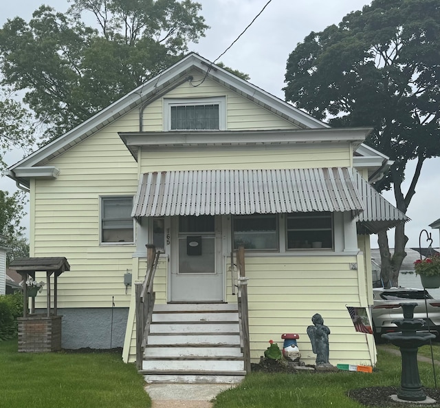 165 Dodge Ave, East Haven, CT 06512 - bungalow-style house featuring entry steps