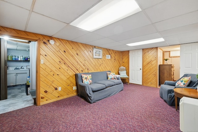 687 Beacon Valley Rd, Naugatuck, CT 06770 - living room featuring carpet, a drop ceiling, and wooden walls