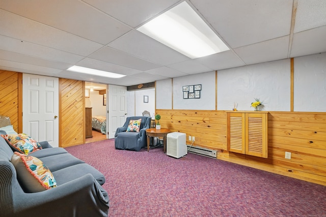 687 Beacon Valley Rd, Naugatuck, CT 06770 - carpeted living area with baseboard heating, a drop ceiling, and wood walls